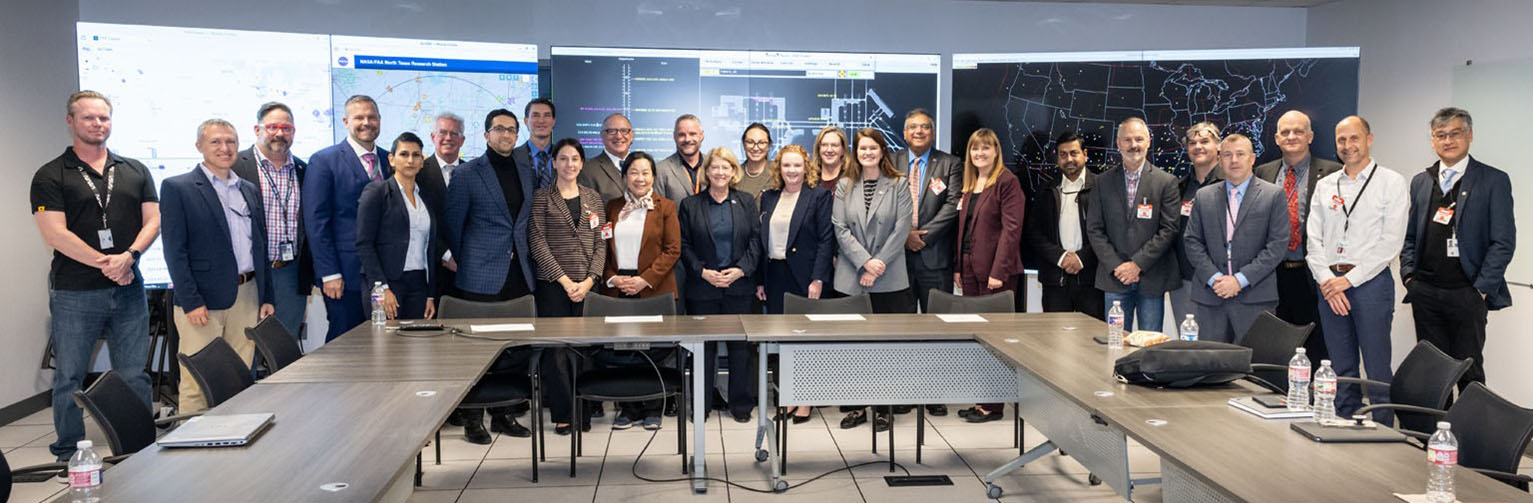 Group photo of 25 NASA NTX staff members and others with NASA’s Deputy Administrator Pam Melroy on Dec. 3, 2024. 