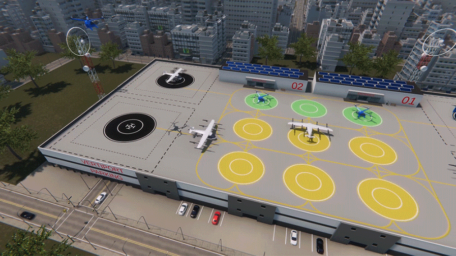 Aerial view of an urban rooftop landing pad with multiple colored circular markers - yellow, green, and black landing zones. Three small aircraft are positioned on the pad, surrounded by city buildings, trees, and parked cars below.